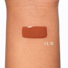 Load image into Gallery viewer, Clay lipgloss swatch on arm