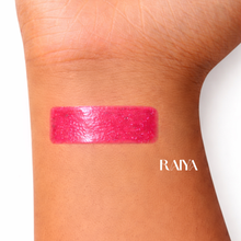 Load image into Gallery viewer, RAIYA after dark lipgloss swatch on arm 
